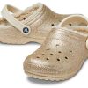 Crocs Classic Clogs mit Glitzerfutter „Gold“ 504271